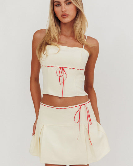 Bone Pleat Mini Skirt
