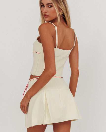 Bone Pleat Mini Skirt