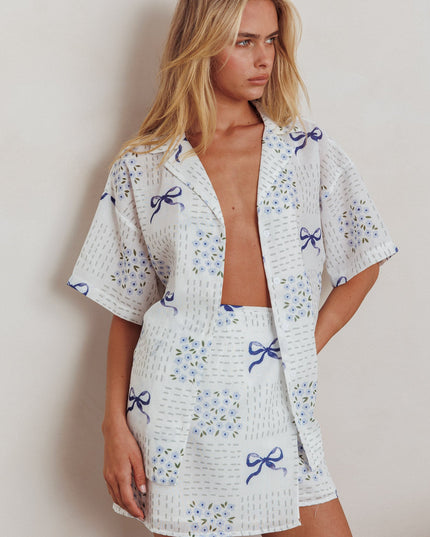 Blue Wrap Mini Skirt Bow Print