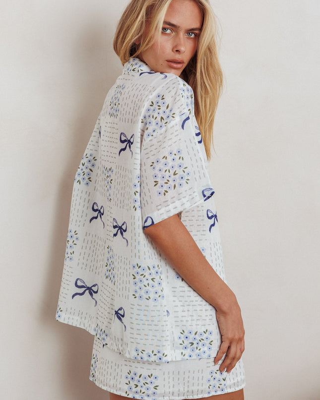 Blue Wrap Mini Skirt Bow Print